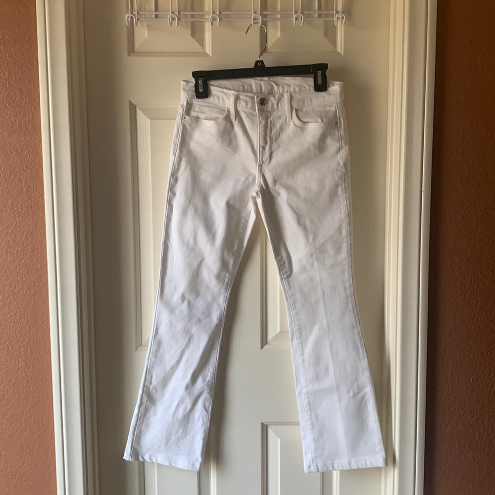 White Straight Cut  Long Women’s Jeans. Fits a size Small. Stretchy.